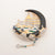 Ishikawa Nobuko Palace Diamond, Sapphire and Onyx Platinum and K18 Yellow Gold Brooch