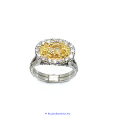 Platinum and 18k Yellow Gold Ladies Fancy Intense Yellow Oval Diamond Ring