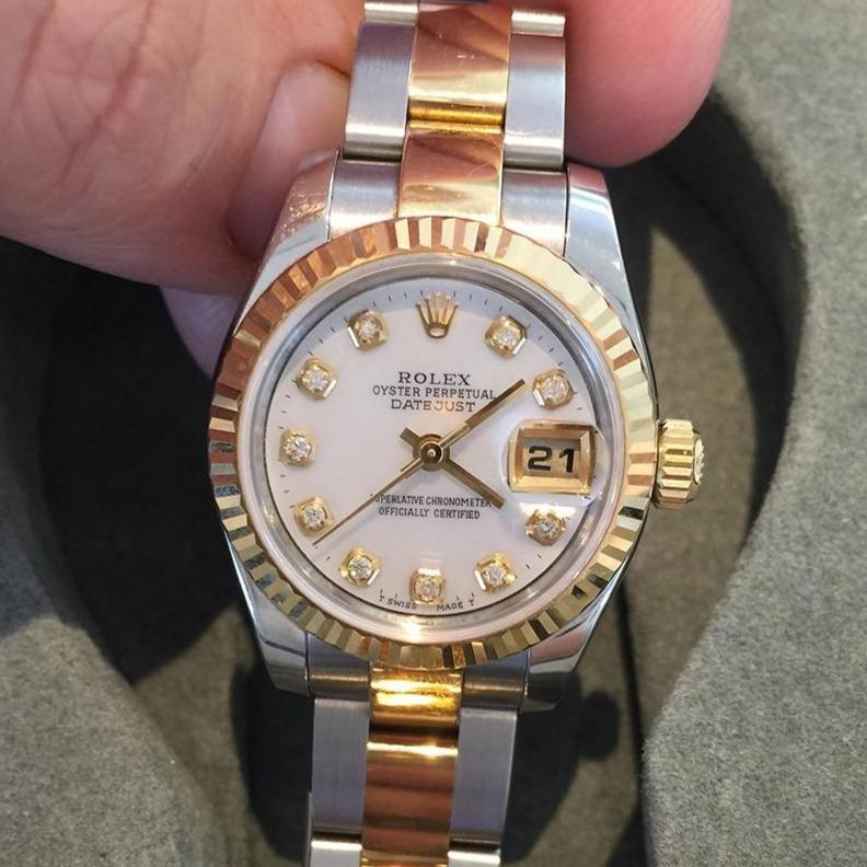 rolex women's mother of pearl watch